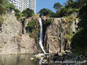 British businessman charged with murder after housekeeper, 25, found at bottom of waterfall in Hong Kong