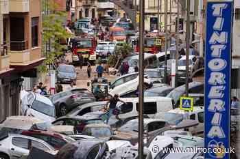 Spain floods: Trapped drivers heard banging on car windows begging to be rescued