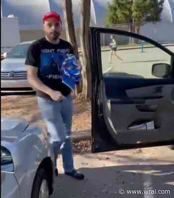 Man caught on video removing, ripping Harris-Walz signs outside Raleigh early voting site