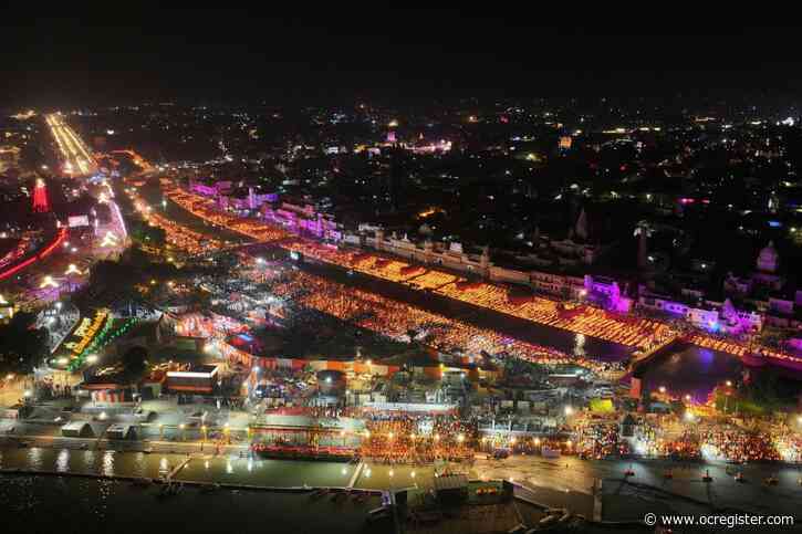 Indians celebrate Diwali by lighting a record number of clay lamps