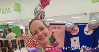 Asda worker shaves head in store for charity