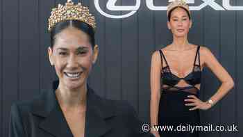 Balinese princess Lindy Klim is the queen of Derby Day in a stunning gold tiara... but misses the mark in a VERY revealing lace black dress as she joins daughter Stella, 18, at Flemington Racecourse