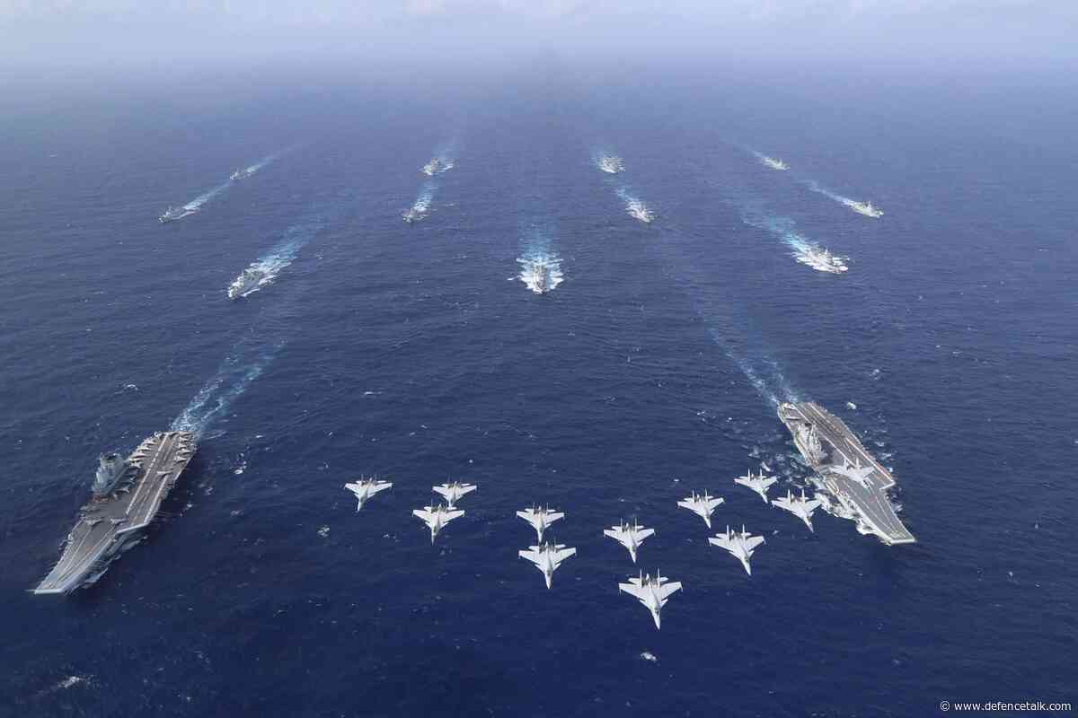 China says holds first dual aircraft carrier drills in South China Sea