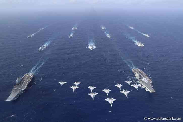 China says holds first dual aircraft carrier drills in South China Sea