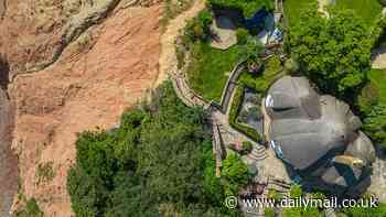 Clifftop residents say they're 'just crossing our fingers and hoping' in their precariously-balanced cottages after massive rockfall nearby just days ago