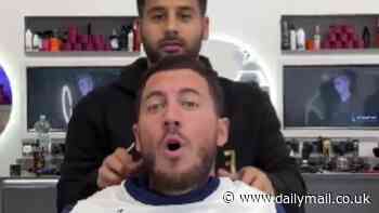 Chelsea legend Eden Hazard reacts hilariously after barber TRICKS him into wearing Tottenham shirt - and issues six-word response