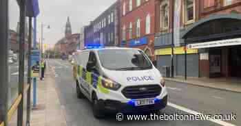 Police detain wanted man in Bolton town centre