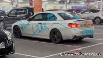 BMW left in Tesco car park is covered in graffiti reading 'cheater', 'liar' and 'f*** you'...but after series of similar stunts, is it real?