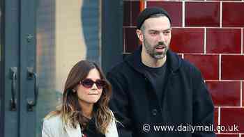 Jenna Coleman and her boyfriend Jamie Childs enjoy a stroll with their baby in London after welcoming first child