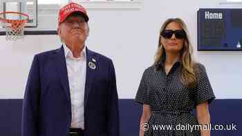 Barron Trump is pictured voting for his father in snap shared by proud mother Melania