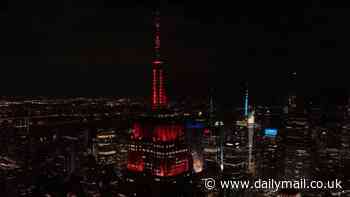 Liberal outrage as iconic NYC landmark sparkles red to celebrate Donald Trump's victory in North Carolina