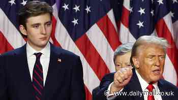 Barron Trump, 18, towers over his family as he celebrates his father's sensational return to the White House