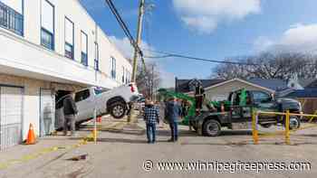 Classes cancelled after truck slams into Holy Cross School