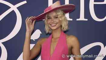 AFL star Josh Daicos' fiancée Annalise Dalins risks a wardrobe malfunction at Oaks Day in a VERY short dress