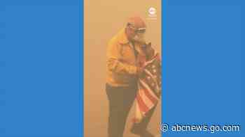 WATCH:  Firefighter saves American flag from California wildfire