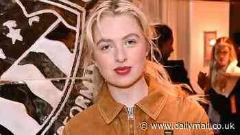 Anais Gallagher looks chic in a tan leather jacket as she joins boyfriend Callum Scott Howells and Freddie Brazier at the Blauer fashion event