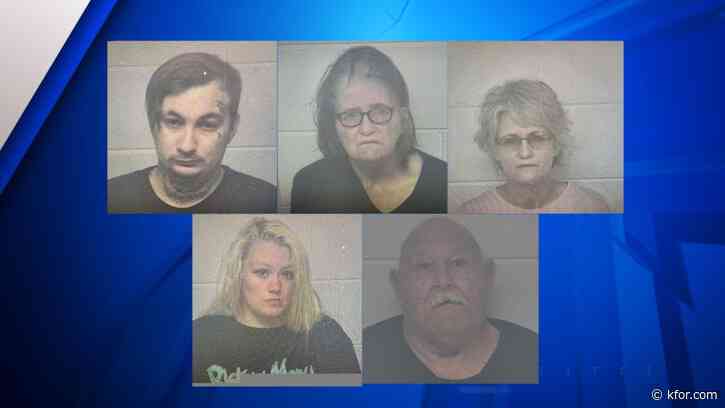 5 charged after 2-year-old, several dogs found caged in Kentucky home: police