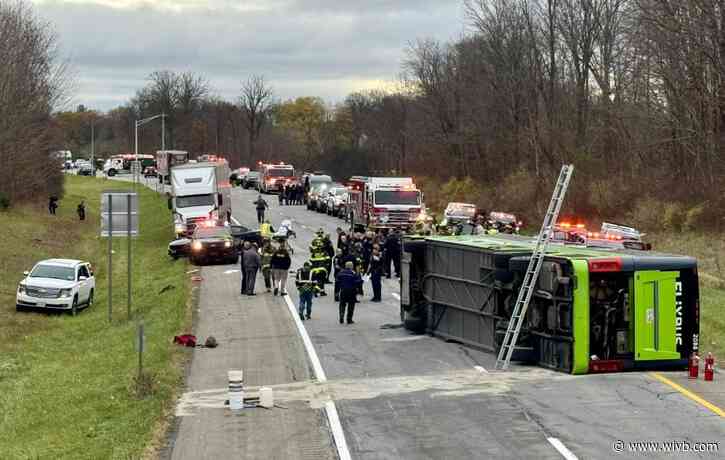 28 hospitalized, driver ticketed after I-490 bus flip