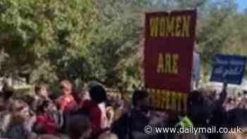 Protesters hold up disturbing 'women are property' signs at Texas college campus