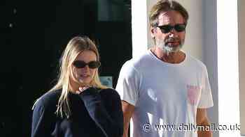 David Duchovny seen on a rare outing with daughter West, 25, as they enjoy a sunny stroll in Los Angeles