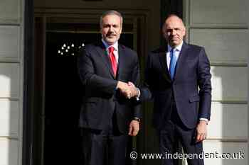 Turkey's foreign minister visits Athens to help mend ties between the regional rivals