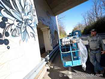 Mural taking shape on footbridge over Anthony Wayne Trail