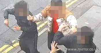 Moment man stabbed on busy street during terrifying gang attack in broad daylight