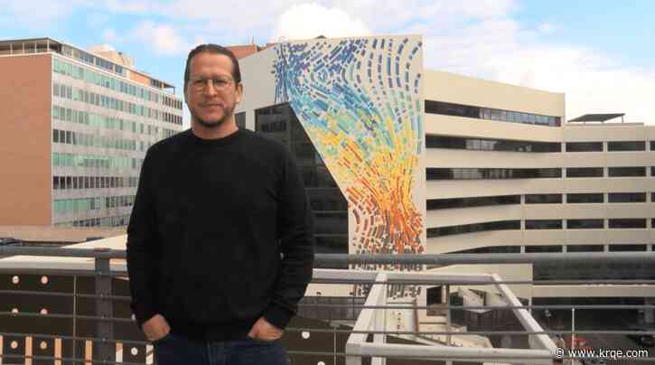 Artist creates 123 foot tall mural in downtown Albuquerque