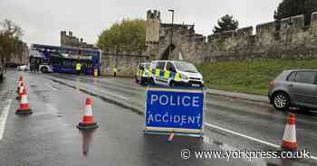 Bus and police van damaged after crash on major road in York