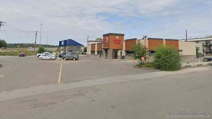 Woman killed after truck crashes through Fort McMurray Boston Pizza