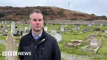 Man visiting war grave of every hometown soldier