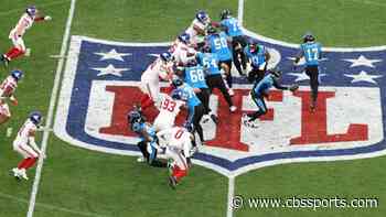 NFL ref Shawn Hochuli shocks as he calls penalty in German during game between Panthers and Giants