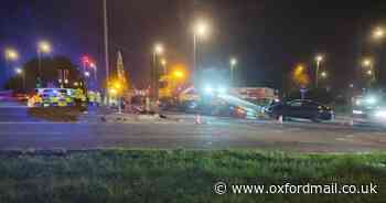 Car flips on its roof in two-vehicle roundabout crash