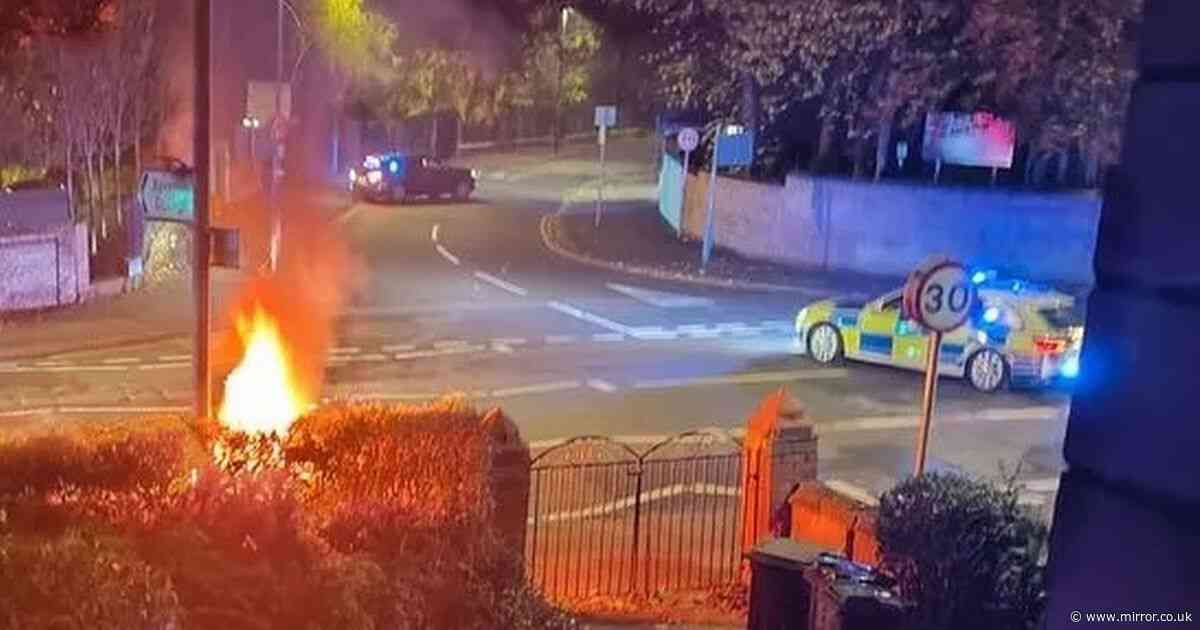 Horrified students wake up to find burning car at bottom of garden following 'loud bang'