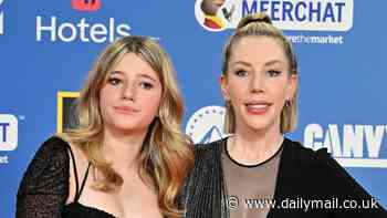 Katherine Ryan, 41, puts on a VERY busty display in mesh paneled dress as she makes rare red carpet appearance with daughter Violet, 15, at the MTV European Music Awards