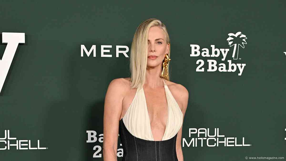 Charlize Theron stuns in plunging gown for special night out