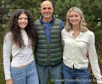 LU students working with prof on book about forestry company