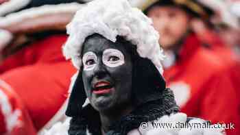 Shock over woman with 'blackface' make up and cotton stuck to her at German carnival