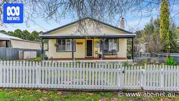 Cute timber cottage sells for 10 times 1999 price as town regains positive outlook