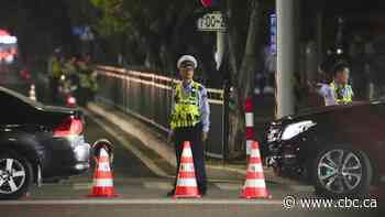 Driver deliberately rams car into crowd in China, killing 35 and injuring dozens