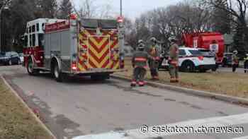 Saskatoon firefighters rescue man trapped inside garbage truck