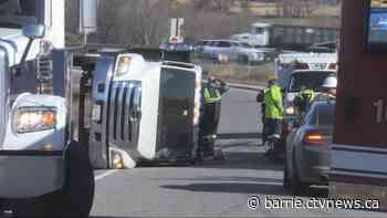 Asphalt truck rollover on Highway 400 exit ramp under investigation