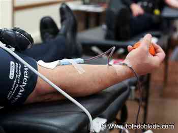 Perrysburg police, fire face off in Battle of Badges blood drive