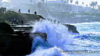 Giant 16ft waves ripping through beaches spark 'stay out of water' warning