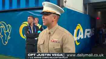 Tear-jerking moment Marine surprises his young son at NFL game on Veterans Day