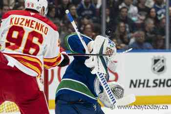 Canucks' Pettersson marks birthday with two points, 3-1 win over Flames