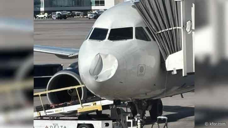 Passenger captures mysterious dent on nose of Delta plane after landing