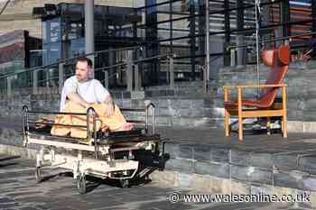 The stark reason a man lay on a trolley outside the Senedd on a cold November day