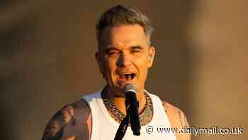 Robbie Williams reveals he 'never felt secure' in Take That after he was almost kicked out the band aged 16 and 'sought safety in drug and alcohol'