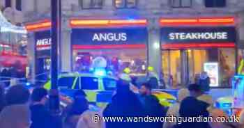 Driver arrested after car smashes into central London restaurant and injures three